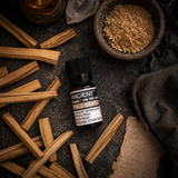 Palo Santo Essential Oil 10ml — overhead lifestyle flat lay