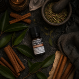 10 ml Cinnamon Essential Oil — overhead lifestyle flat lay