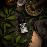 10 ml Ravensara Essential Oil — overhead lifestyle flat lay