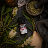 10 ml Niaouli Essential Oil — overhead lifestyle flat lay