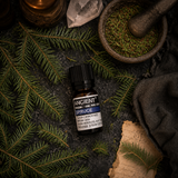 10 ml Spruce Essential Oil — overhead lifestyle flat lay